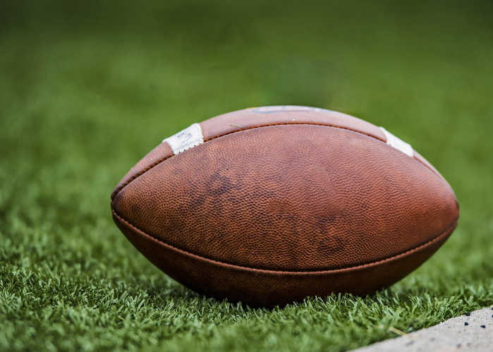 NCAA American Pigskin Football on Grass